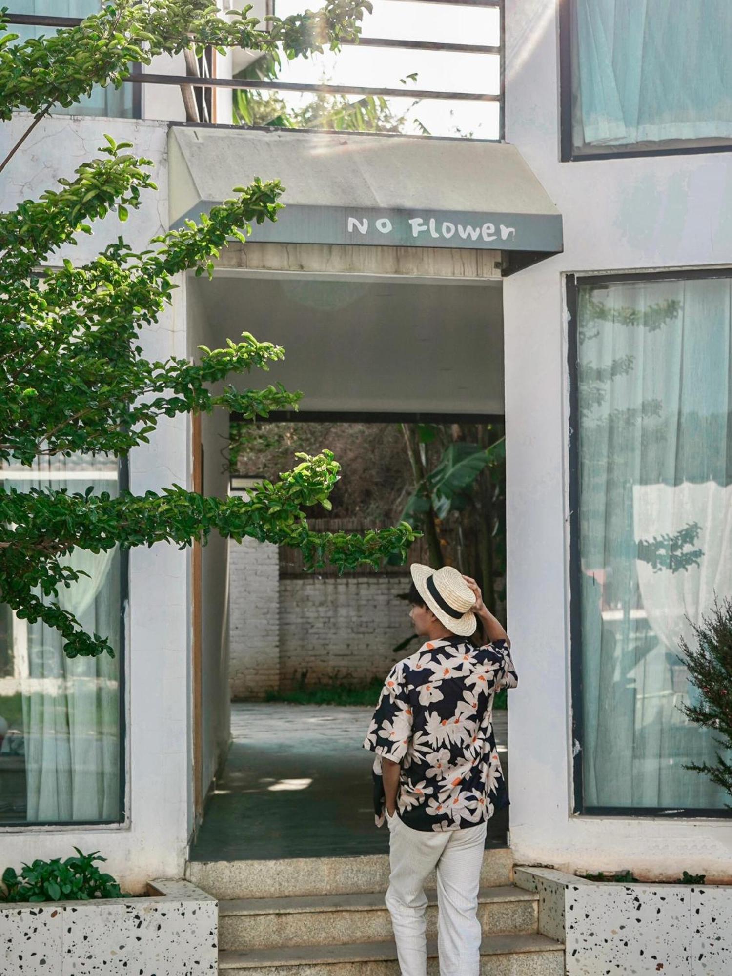 No Flowers Boutique Hostel Kunming Buitenkant foto